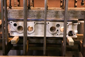 cylinder-head-in-pressure-testing-machine-side-view